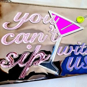 NWT I.N.C. "The VIP Section" metallic silver wristlet purse. (Only two in stock)